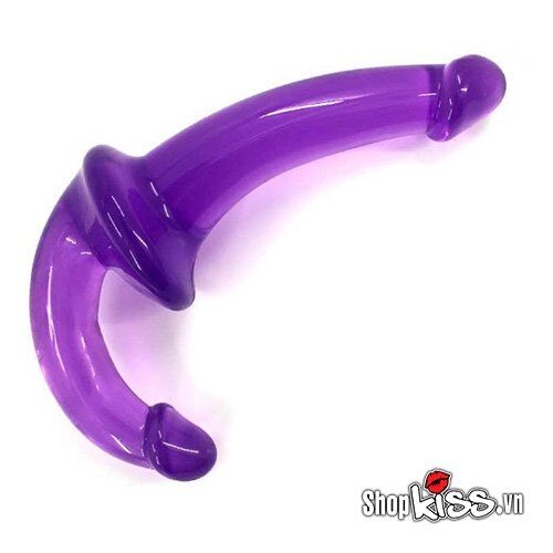 Hình ảnh mô tả dương vật silicone 2 đầu mềm mại DC79F màu tím đang được uốn cong, thể hiện tính linh hoạt của chất liệu silicone cao cấp